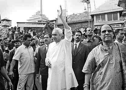 CM Naveen Patnaik waves to public in front of Jagannath Temple in Puri on Monday