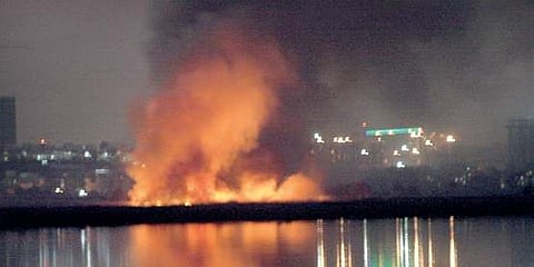 The fire continued to burn late into the evening | S Manjunath
