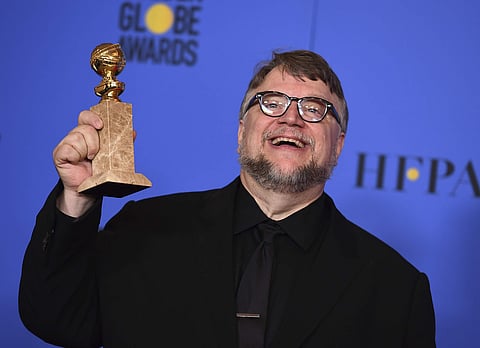 A file image of Guillermo del Toro posing in the press room with the award for best director for 'The Shape of Water' at the 75th annual Golden Globe Awards. (Photo | AP)