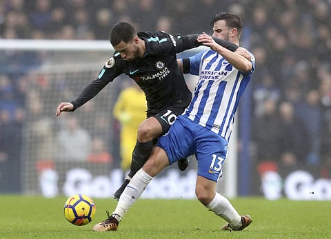 Chelsea's Eden Hazard, left, and Brighton & Hove Albion's Pascal Gross during their English Premier League soccer match at the AMEX Stadium in Brighton, England. | AP