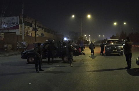 Policemen block the main road near the Intercontinental Hotel after a deadly attack in Kabul, Afghanistan, Saturday, Jan. 20, 2018. | AP