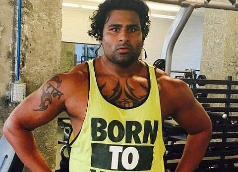 Rinku Singh, 29, a village boy from Bhadohi district of eastern UP and former baseball pitcher is set to participate in World Wrestling Entertainment. | EPS