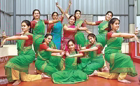 Lakshmy Ramaswamy (middle) with her troupe of dancers Martin Louis