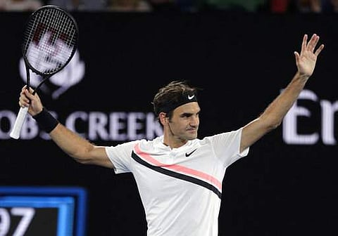 Switzerland's Roger Federer celebrates after defeating Tomas Berdych of the Czech Republic in their quarterfinal at the Australian Open tennis championships in Melbourne. | AP