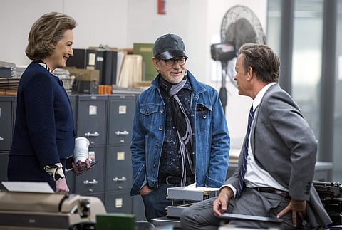 This image released by 20th Century Fox shows actress Meryl Streep, (from left), director Steven Spielberg, and actor Tom Hanks on the set of 'The Post.' (Photo | AP)