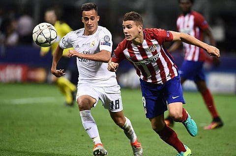 Atletico Madrid's French defender Lucas Hernandez (R) | AP