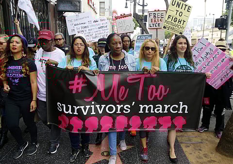 Participants march against sexual assault and harassment at the #MeToo March in the Hollywood section of Los Angeles on Sunday, Nov. 12, 2017. | AP