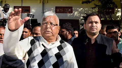 RJD supremo Lalu Prasad Yadav and his son Tejashwi Yadav.