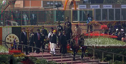 Prime Minister Narendra Modi waves as he leaves with President Ram Nath Kovind after the 69th Republic Day Parade at Rajpath in New Delhi on friday. (Express photo by Shekhar yadav)
