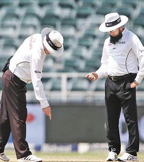 Umpires inspect the pitch on Day 3 of the third Test in Johannesburg | BCCI