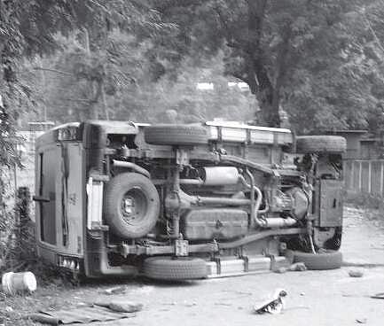 A vehicle overturned in Thursday’s violence at Maibong | Express Photo