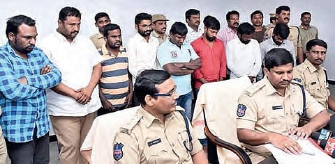 SP DV Srinivas Rao addresses media persons about Congress leader Srinivas’ murder. Standing behind him are the accused | EXPRESS