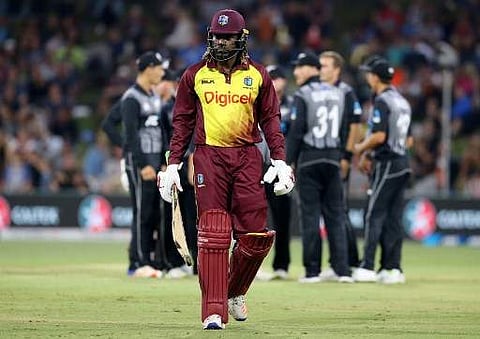 West Indies batsman Chris Gayle walks off the field after he was dismissed during the third T20 between New Zealand and the West Indies at Bay Oval in Mount Maunganui on January 3, 2018. | AFP