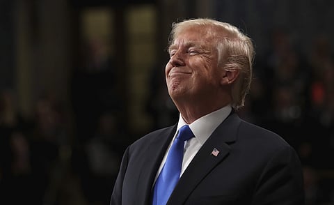 President Donald Trump smiles during State of the Union address in the House chamber of the U.S. Capitol to a joint session of Congress Tuesday, Jan. 30, 2018 in Washington. | AP