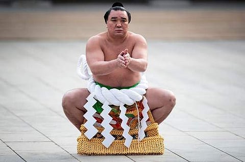 This photo taken on January 6, 2017 shows Mongolian-born sumo grand champion or 'yokozuna' Harumafuji performing a ring-entering ceremony. (File | AFP)