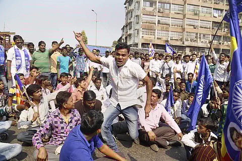 Dalit protesters block a road during Maharashtra bandh called over Koregaon violence in Thane, Mumbai on Wednesday. (PTI)