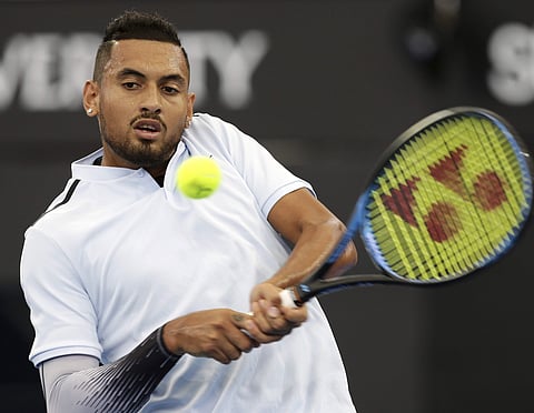 Nick Kyrgios of Australia plays a shot in his quarter final match against Alexandr Dolgopolov of Ukraine during the Brisbane International tennis tournament in Brisbane, Australia, Friday, Jan. 5, 2018. | AP