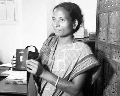 Dinja Jakesika shows her passport in panchayat office | Express