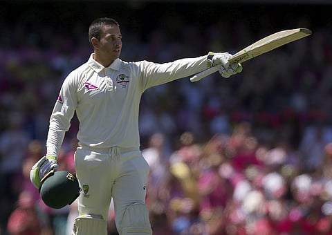 Australia's Usman Khawaja celebrates making 100 runs against England during the third day of their Ashes cricket test match in Sydney, Saturday, Jan. 6, 2018. | AP