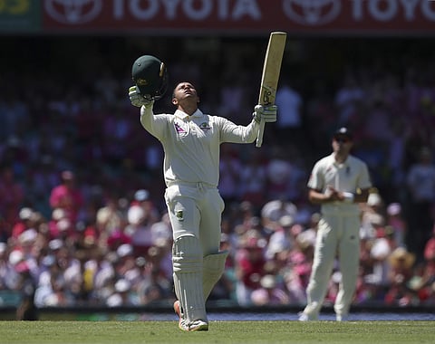 Australia's Usman Khawaja celebrates making 100 runs against England during the third day of their Ashes cricket test match in Sydney, Saturday, Jan. 6, 2018. | AP