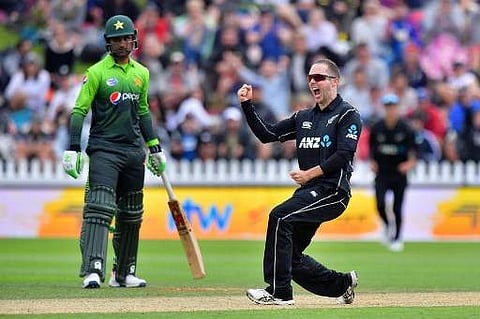 New Zealand's Todd Astle (R) celebrates Pakistan's Sarfraz Ahmed being caught with LBW during the first ODI between New Zealand and Pakistan at Basin Reserve in Wellington on January 6, 2018. | AFP