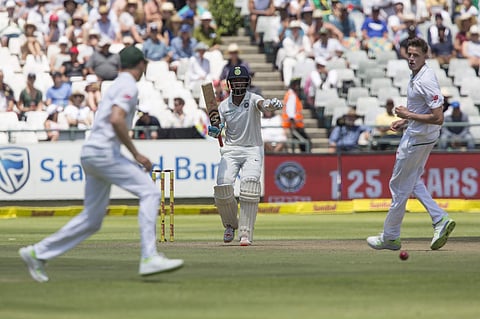 Indian batsman Cheteshwar Pujara bats during the second day of the first Test between South Africa and India at Newlands Stadium, in Cape Town. | AP
