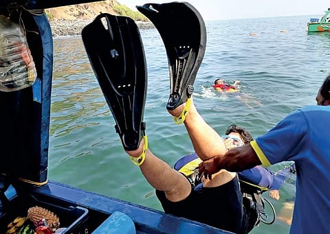 A visitor trying scuba diving at Netrani Island near Murdeshwar on Friday