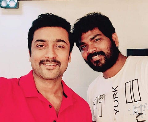 Vighnesh Shivn with Suriya