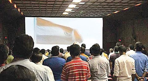 Representational image. People standing for national anthem in a cinema hall. | (File Photo)