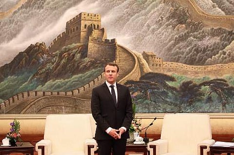 Macron, who speaks fluent English, was applauded for his efforts on China's Twitter-like Weibo platform Tuesday. (Photo | AFP)