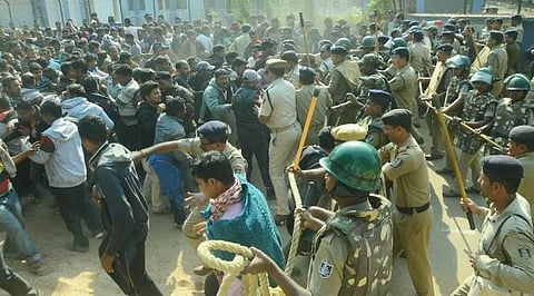 Ambulance staff clash with police