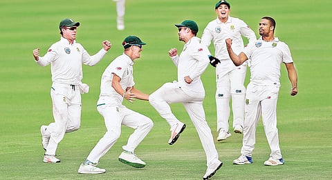 South Africa’s Vernon Philander (R) celebrates with teammates after their win against India on Day 4 of the first Test at the Newlands Cricket Ground in Cape Town on Monday | BCCI