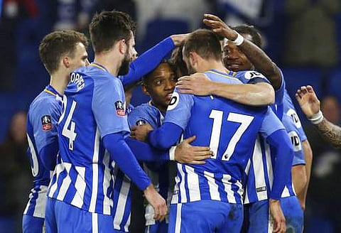 Brighton & Hove Albion's Glenn Murray, 17, celebrates scoring his side's second goal of the game against Crystal Palace during their English FA Cup, Third Round soccer match at the AMEX Stadium in Brighton on Monday. (Photo: AP)