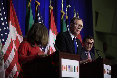 U.S. Trade Representative Robert Lighthizer, center, with Canadian Minister of Foreign Affairs Chrystia Freeland, left, and Mexico's Secretary of Economy Ildefonso Guajardo Villarreal, right, speaks during the conclusion of the fourth round of negotiation