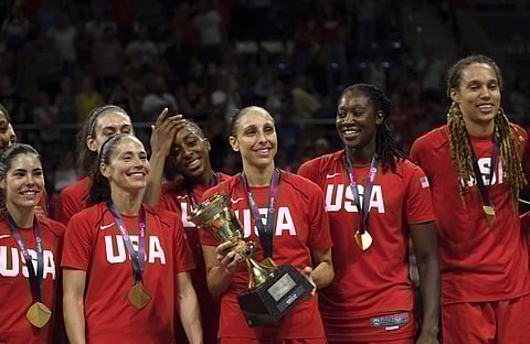 United States players celebrate after winning the Women's basketball World Cup final match between Australia and the U.S.A. in Tenerife, Spain, Sunday Sept. 30, 2018. (AP Photo/Andres Gutierrez)