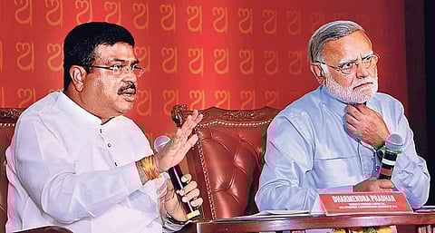 Union Minister Dharmendra Pradhan with Editorial Director of TNIE Prabhu Chawla I Express