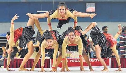 Indian teams perform at the free flow Yoga dance event of the Asian Yoga Sports Championships in Thiruvananthapuram on Sunday