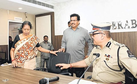 Koti Purshotham and his wife Koti Vinodini surrender before Hyderabad Police Commissioner Anjani Kumar, in Hyderabad on Tuesday | Express