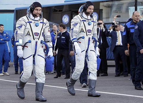 NASA astronaut Nick Hague and Roscosmos' Alexei Ovchinin ( Photo | AP)