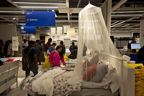 The Hyderabad store will have a range of 7,500 items to sell. The company has planned to open 25 outlets in India. IN PIC: Indian customers check the furnishings inside IKEA's first store in India as it opened in Hyderabad. (Photo | AP)