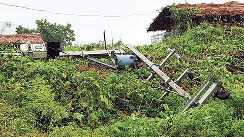 An uprooted electricity pole in Ramnaguda | Express