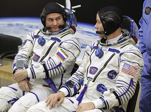 U.S. astronaut Nick Hague, right and Russian cosmonaut Alexey Ovchinin, member of the main crew of the expedition to the International Space Station (ISS). ( Photo | AP)