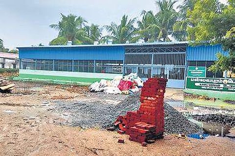 A composting unit is set up inside a burial ground, encroaching the lake