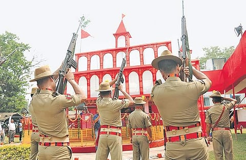 Head priest Shahdeo Updhyaya performs a puja of the weapons