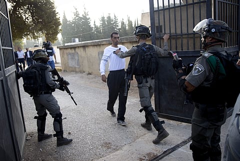 Israeli soldiers close the entrance to the school in the village of Sawyeh near the West Bank city of Nablus | AP