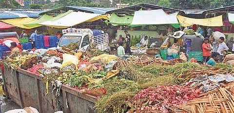 A bin overflowing with garbage at Swaraj Maidan rythu bazaar | P Ravindra Babu