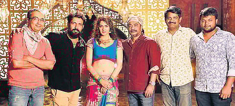 Director Ravi Varma along with Mahendra Simha, Sakshi Chaudhary, Raju Sundaram and team