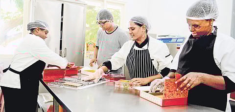 Staff at Writer's Cafe busy packing chocolates for Diwali gift boxes Debadatta Mallick