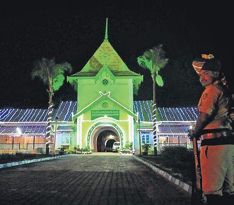 A view of the illuminated heritage KARP Mounted Police building in Mysuru;