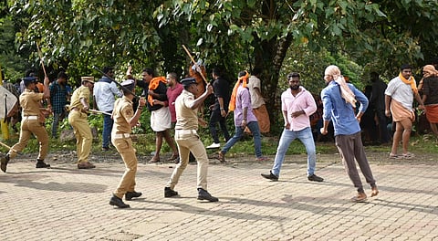 Police lathi-charge on protestors after they opposed the entry of girls and women into the hill shrine of Lord Ayyappa Temple in Sabarimala, Kerala. (Photo | PTI)